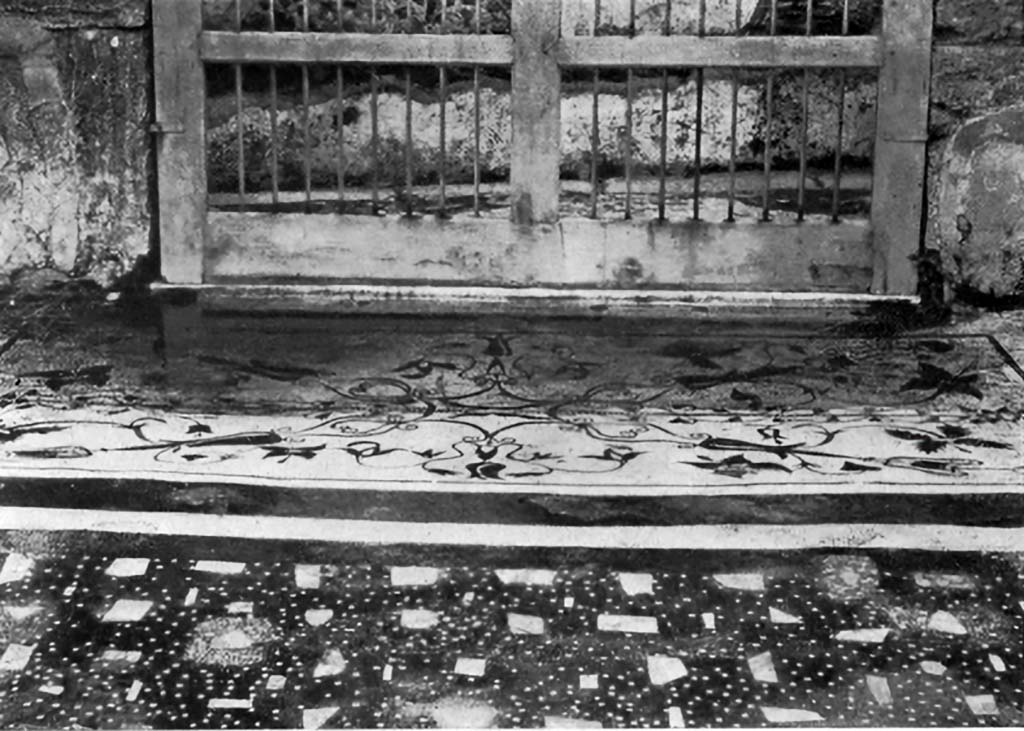 VII.16.13, Pompeii. Doorway threshold and mosaic flooring, c.1930.
According to Blake –
Towards the rear of the atrium of Insula Occidentalis 13, under the spot where a piece of furniture once stood, coloured limestones alone are used in the pavement of this type, whereas the front of the room, paved in the same technique, exhibits a great variety of precious marbles in the midst of the limestones. Between the two parts is a large and careful ancient restoration. Whether we are dealing here with two pavements of different periods, one using coloured limestones, the other pieces of marble, or with a bit of ancient economy which relegated the less precious material to the parts of the floor which would not show, is difficult to say. The impluvium is surrounded by an elaborate guilloche border in colours. (p.61)
She also says, under her description of Floral Bands –
The main threshold of Insula Occidentalis 13, although perhaps laid in Roman times, is absolutely Hellenistic in spirit. (p.108)
See Blake, M., (1930). The pavements of the Roman Buildings of the Republic and Early Empire. Rome, MAAR, 8, (p.61 & p.108. (pl.11, tav.3).