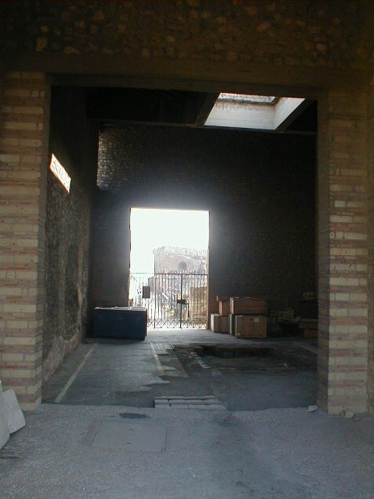 VII.16.17-22 Pompeii. December 2007. Looking east across atrium and impluvium towards entrance doorway, from portico of upper terrace.