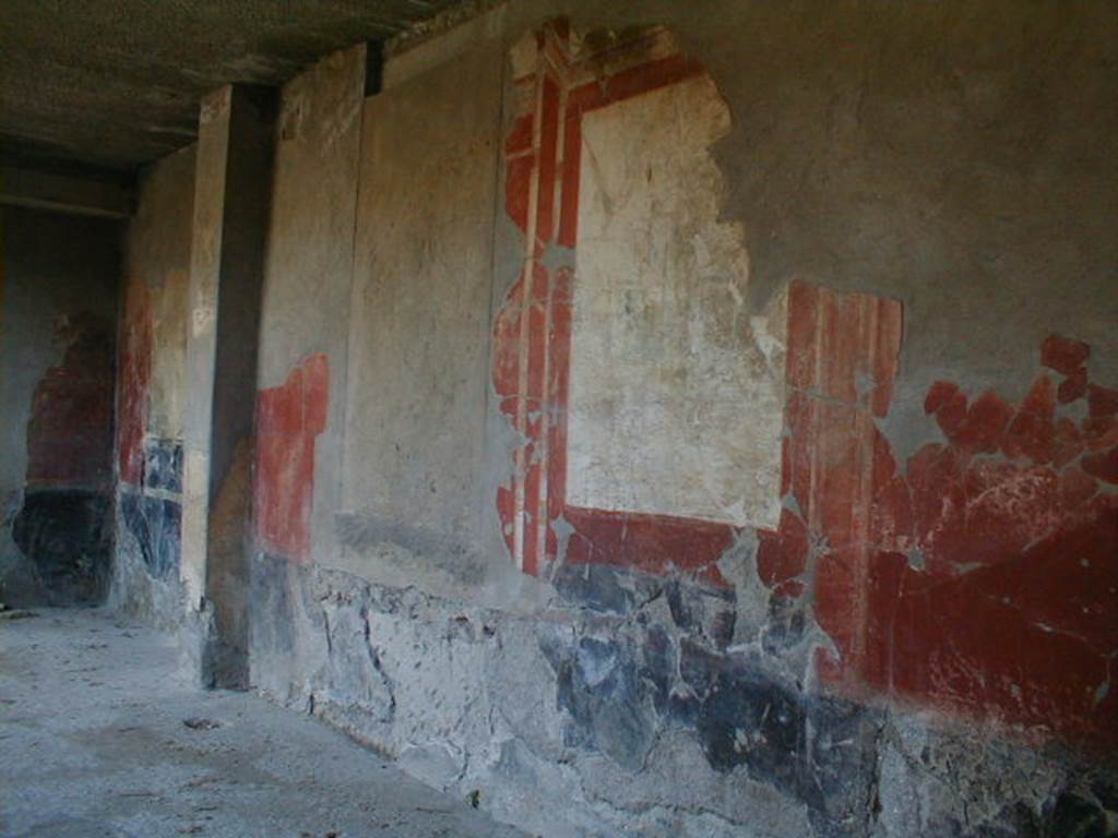 VII.16.17-22 Pompeii. December 2007. Portico (2), looking north along east wall in House of Maius Castricius from south end.
