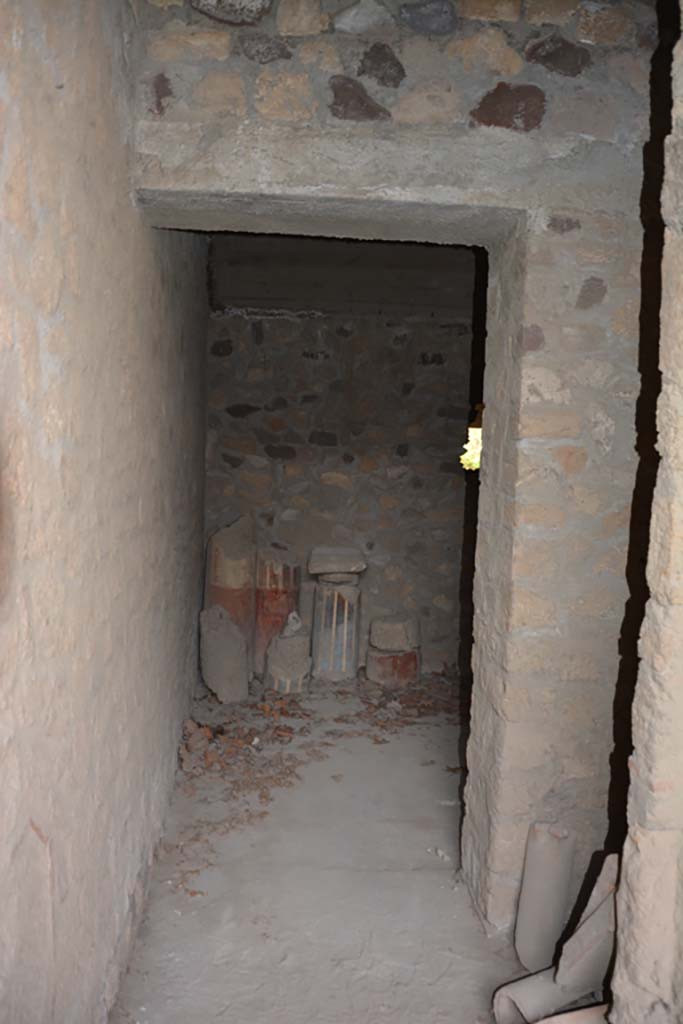 VII.16.17-22 Pompeii. October 2018. 
Doorway into room 13 containing some columns with unknown provenance.
Foto Annette Haug, ERC Grant 681269 DCOR.
