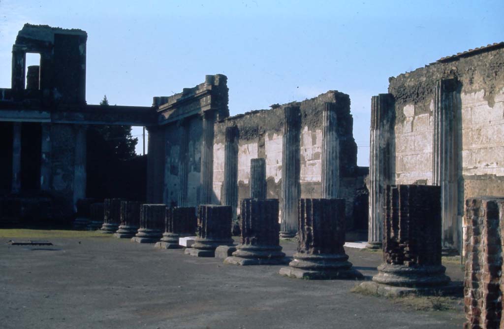 VIII.1.1 Pompeii. 4th December 1971. Looking north-west across Basilica, and along north wall with entrance at VIII.1.2.
Photo courtesy of Rick Bauer, from Dr George Fay’s slides collection.