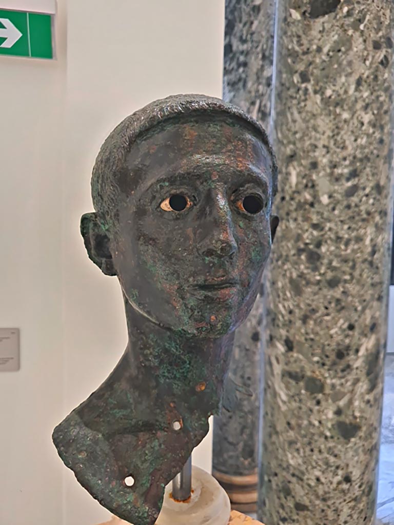 VIII.1.1 Pompeii. April 2023.
Detail of bronze bust of young man said to be Marcellus, nephew of Augustus, found in the area of the Basilica.
On display in “Campania Romana” gallery in Naples Archaeological Museum. Photo courtesy of Giuseppe Ciaramella.