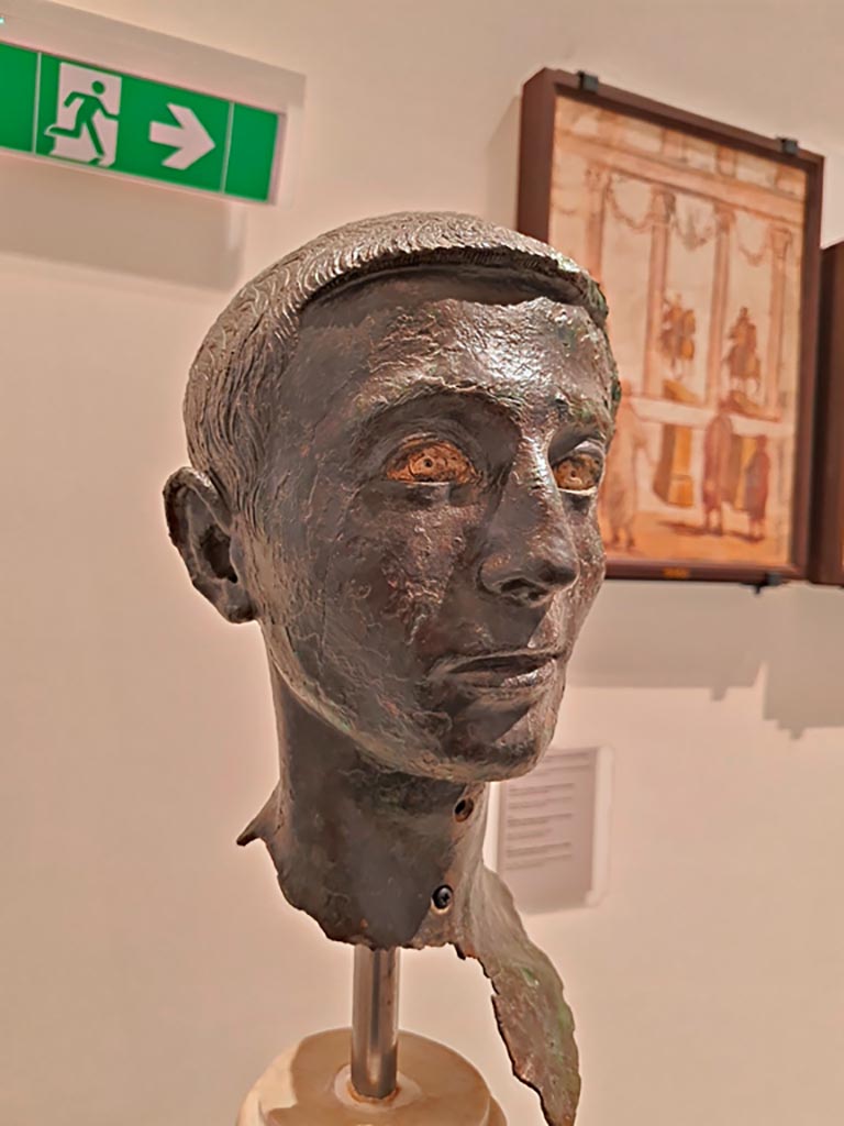 VIII.1.1 Pompeii. April 2023. Detail of bronze bust of a young unknown man, found in the Basilica.
On display in “Campania Romana” gallery in Naples Archaeological Museum. Photo courtesy of Giuseppe Ciaramella.