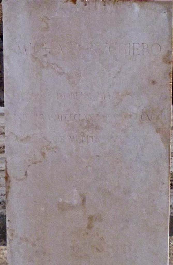 Larario dei Pompeianisti. Pompeii. September 2016. Inscription under bust of Michele Ruggiero. This refers to him as Michael rather than Michele.
Photo courtesy of Michael Binns.

MICHAEL RVGGIERO
ARCHITECTO
PRAEFECTO POMPEIORVM EFFOSSIONIBVS
I?NDE AB A MDCCCLXXV AD A MDCCCXCIII
OB MERITA EIVS


