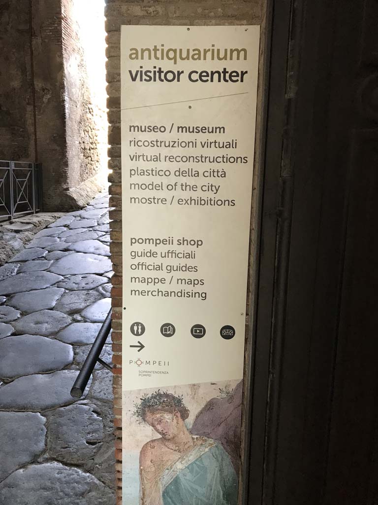 VIII.1.4 Pompeii Antiquarium. April 2019. Looking east under Porta Marina to display advert on east side of doorway.
Photo courtesy of Rick Bauer.