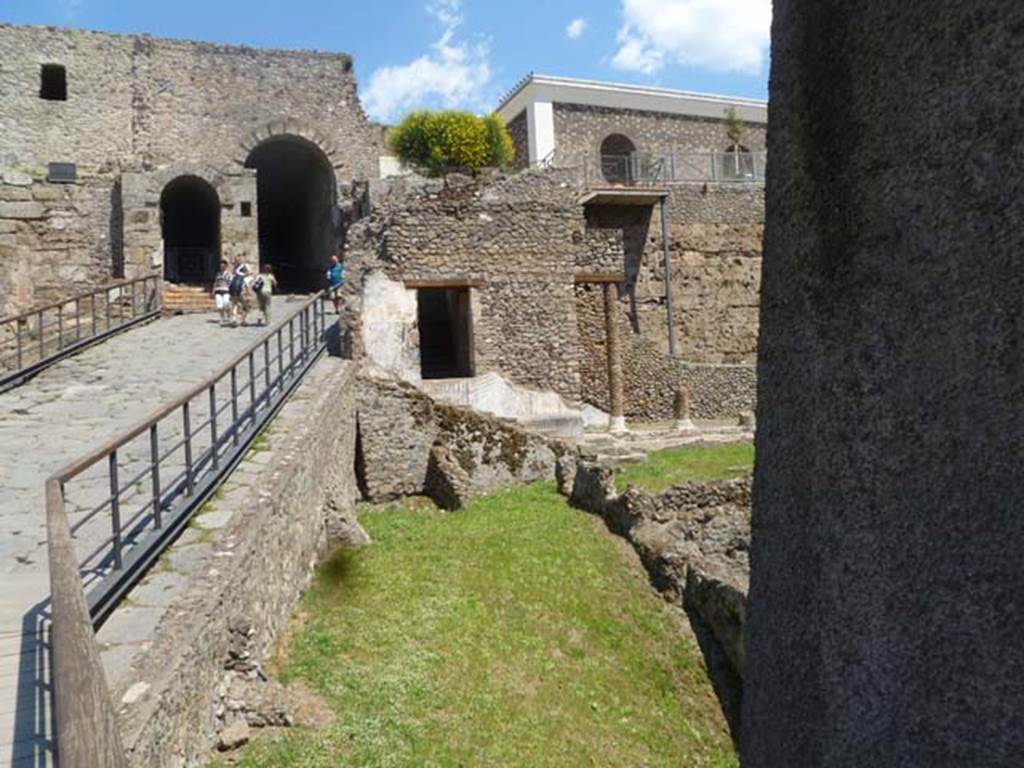 VIII.1.a Pompeii. May 2011. Looking east to stairs at north end of portico, and Porta Marina. Photo courtesy of Michael Binns.