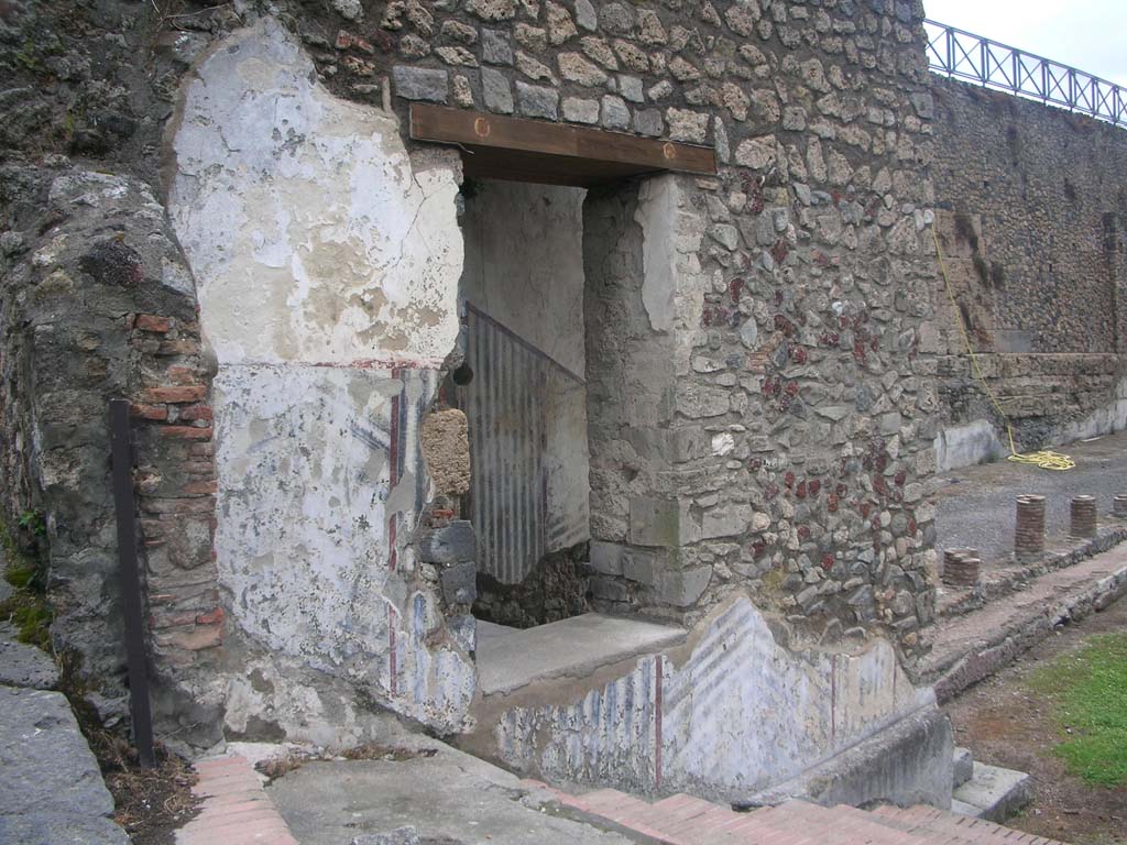 VIII.1.a, Pompeii. May 2011. Looking through window to steps, at north end of portico. Photo courtesy of Ivo van der Graaff.