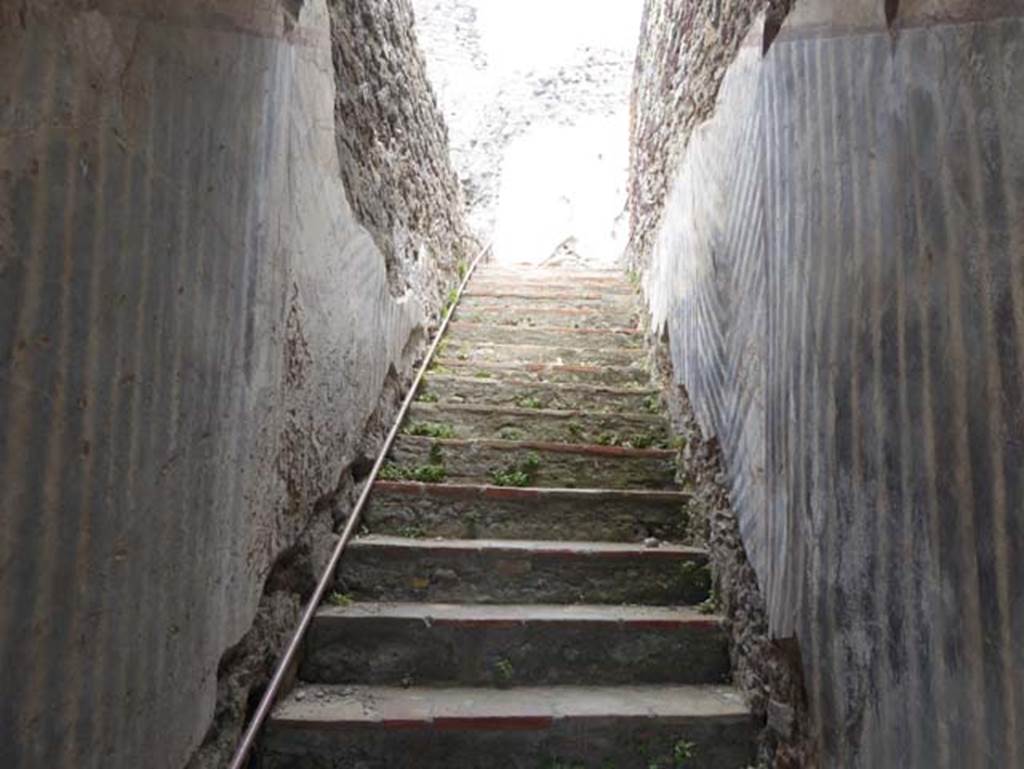 VIII.1.a, Pompeii. June 2017. Looking east up steps from landing with window overlooking outside steps. Photo courtesy of Michael Binns.