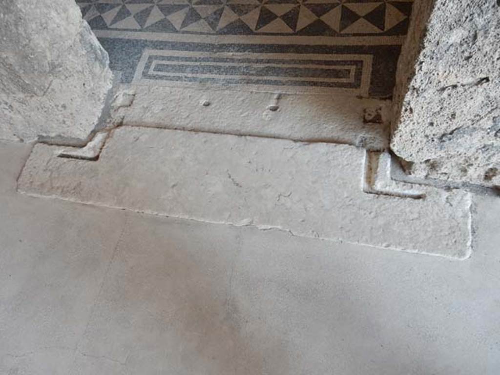 VIII.2.1 Pompeii. May 2018. Threshold of doorway to ala on east side of atrium. Photo courtesy of Buzz Ferebee.