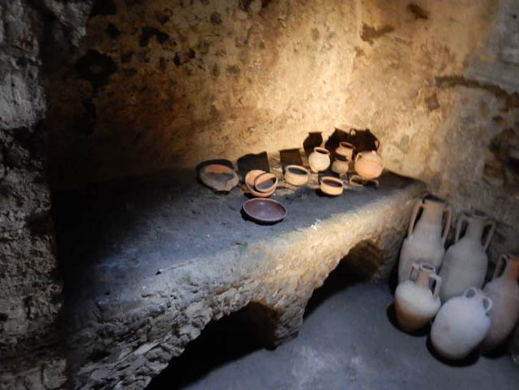 VIII.2.1 Pompeii. May 2018. 
Looking west through doorway to kitchen D on west side of east corridor/cryptoporticus. Photo courtesy of Buzz Ferebee.


