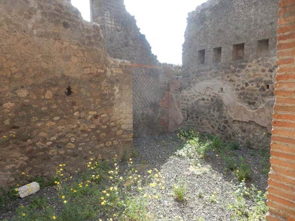 VIII.2.16 Pompeii. May 2017. Looking towards south-east corner of room, and opening leading in direction of entrance corridor, which would have been under the stairs to the upper floor. Photo courtesy of Buzz Ferebee.