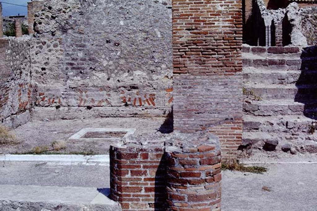 VIII.2.16 Pompeii. 1968. Looking from north portico towards triclinium with shallow marble basin/tub and steps to upper floor. On the wall zoccolo of the triclinium, large fragments of ceramics embedded in the rough plaster can be seen which were the marks from the marble slabs used as cladding. Photo by Stanley A. Jashemski.
Source: The Wilhelmina and Stanley A. Jashemski archive in the University of Maryland Library, Special Collections (See collection page) and made available under the Creative Commons Attribution-Non Commercial License v.4. See Licence and use details.
J68f1183
