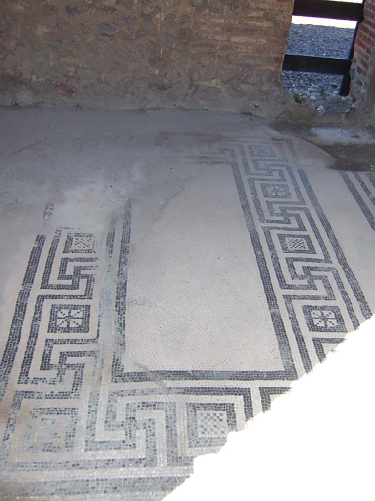 VIII.2.16 Pompeii. September 2005. 
Cubiculum on north side of atrium with mosaic floor and a windowed niche, looking into atrium of VIII.2.14. 
