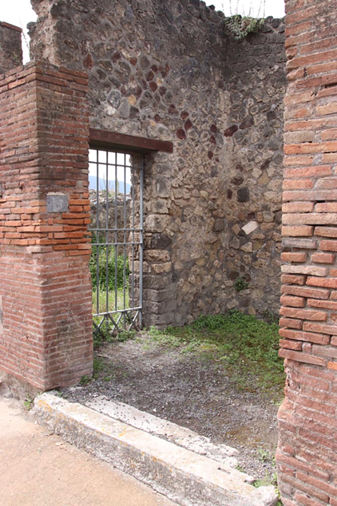 VIII.2.19 Pompeii. May 2024.
Looking towards entrance doorway and south wall with doorway to VIII.2.20. Photo courtesy of Klaus Heese.