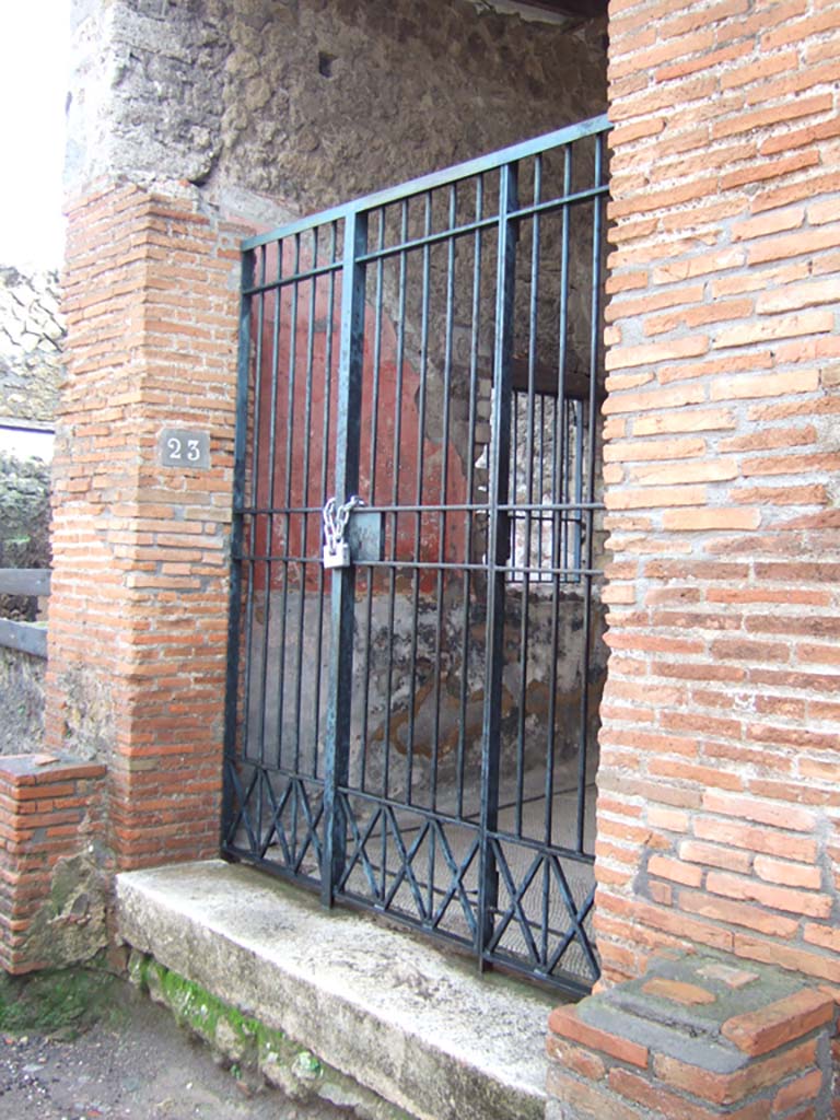 VIII.2.23 Pompeii. December 2004. Entrance doorway and east wall of entrance corridor.