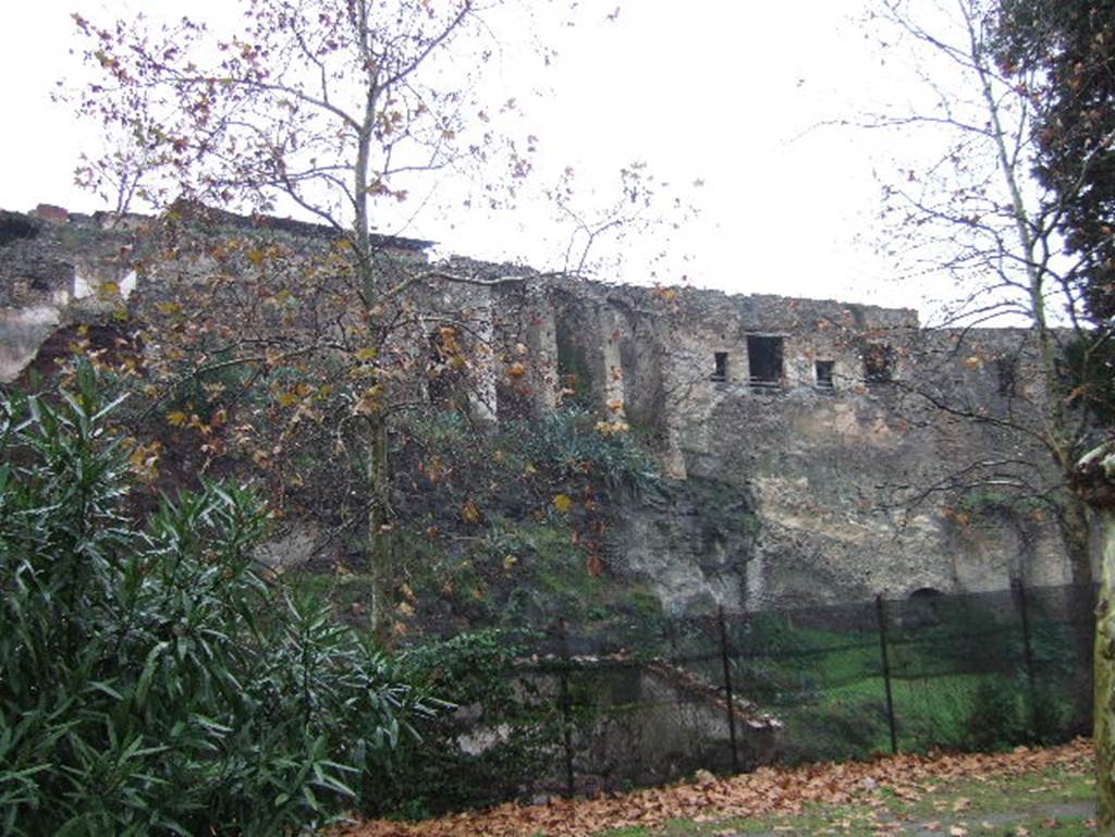 Pompeii, December 2005. Looking north to rear of  VIII.2.26, with four windows