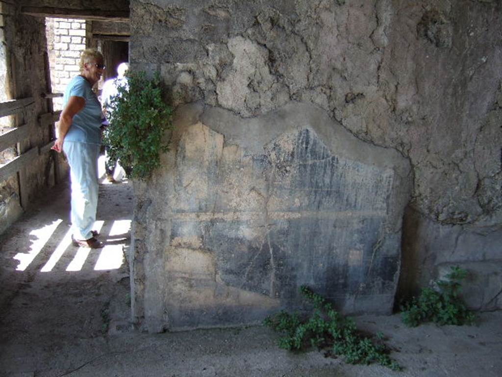 VIII.2.26 Pompeii. September 2005. Room 6, west wall of triclinium, looking west through narrow doorway along corridor.