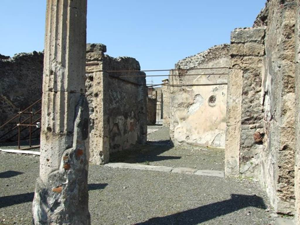 VIII.4.15 Pompeii. March 2009. Room 5, oecus.  Looking north towards the north-east corner of the portico, the oecus, and the small doorway into the atrium. According to Fiorelli, when excavated this oecus had two paintings on its walls.  He thought one was Paris and Oenone. 
The other representing two bearded men talking together and accompanying their words with gestures.  Helbig wrote, this room had paintings of Paris and Oenone (1280) and the other was unclear (1398).
See Helbig, W., 1868. Wandgemlde der vom Vesuv verschtteten Stdte Campaniens. Leipzig: Breitkopf und Hrtel.
See Pappalardo, U., 2001. La Descrizione di Pompei per Giuseppe Fiorelli (1875). Napoli: Massa Editore. (p.129)


