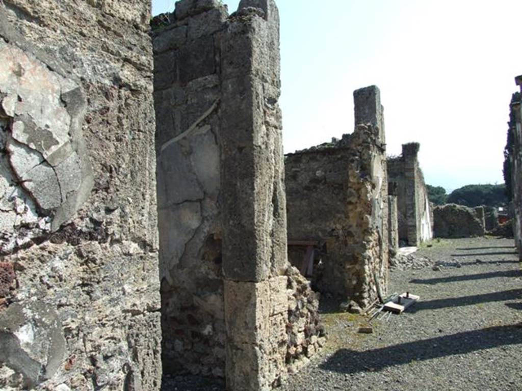 VIII.4.15 Pompeii.  March 2009.  Doorways to room 12 and 13 on east portico.  Looking south.