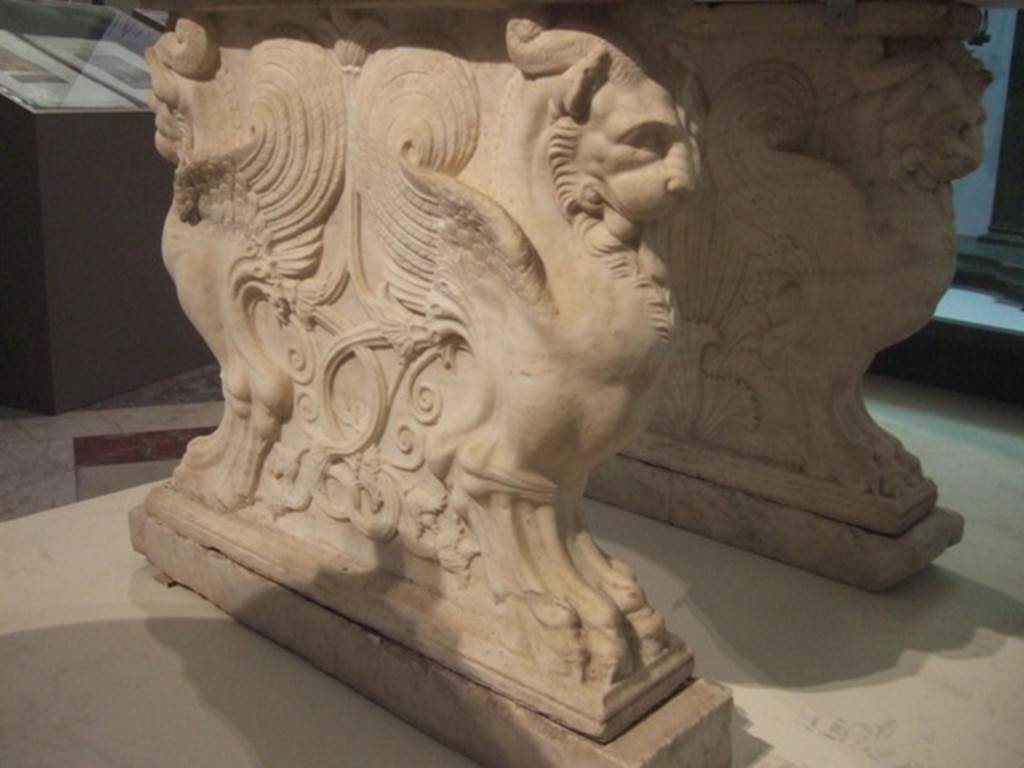 VIII.4.15 Pompeii.  December 2007.  Griffins on supports for a marble table or cartibulum.   Now in Naples Archaeological Museum.
.