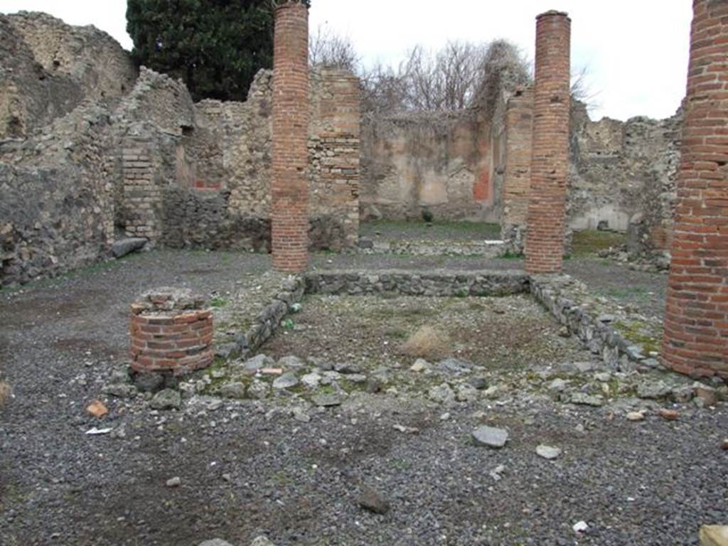 VIII.4.34 Pompeii. December 2007. Looking north across tetrastyle atrium. The tablinum is at the rear. According to Breton, in the tablinum were two well preserved wall paintings, to the right Hercules and Omphale, to the left an unidentified subject. Helbig agreed.
See Breton, Ernest. 1870. Pompeia, Guide de visite a Pompei, 3rd ed. Paris, Guerin. 
See Helbig, W., 1868. Wandgemlde der vom Vesuv verschtteten Stdte Campaniens. Leipzig: Breitkopf und Hrtel. (1136 and 971)
