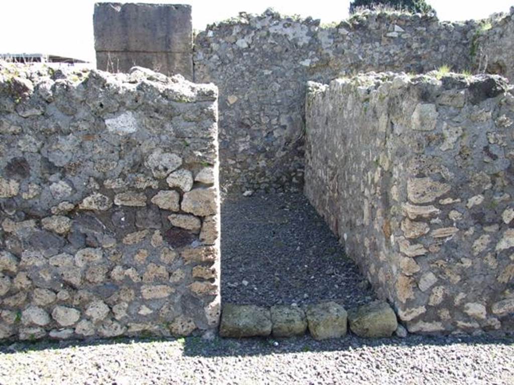 VIII.5.28 Pompeii. March 2009. Doorway to room 13, on east portico - a small room on east side of peristyle garden.

