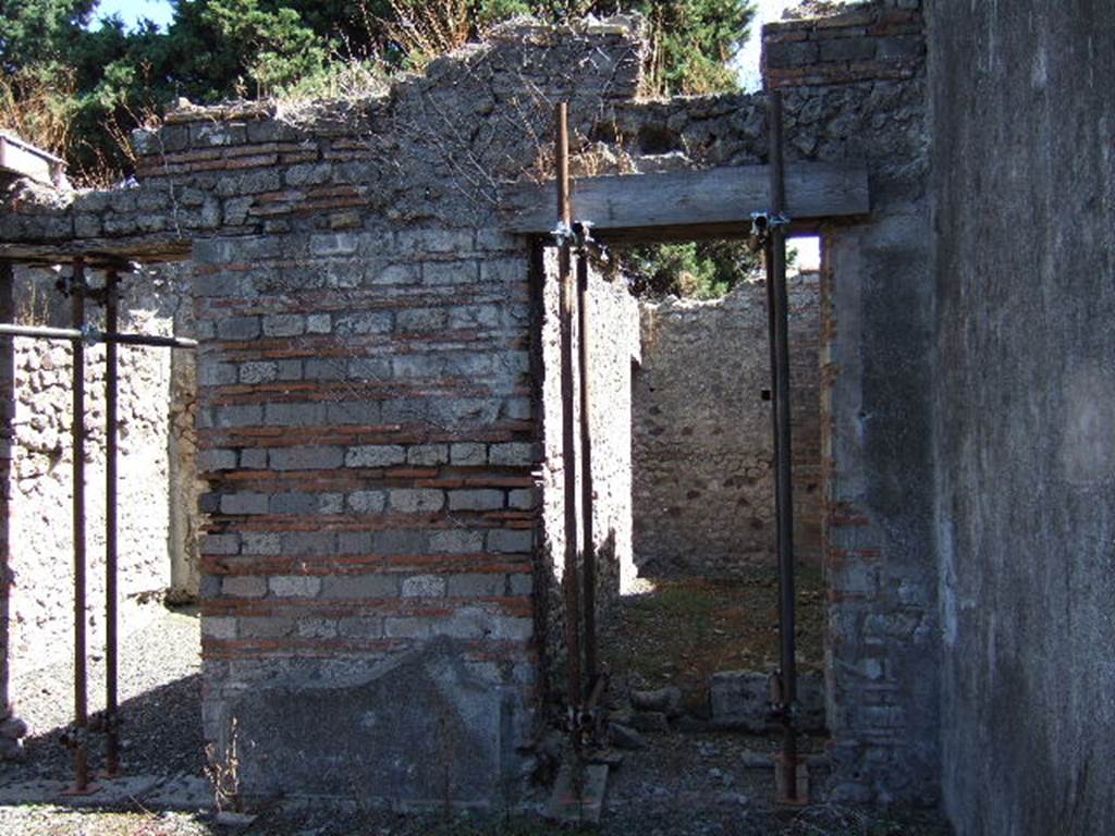 VIII.5.37 Pompeii.  March 2009. Doorway to Room 2. Small room with staircase to upper floor.