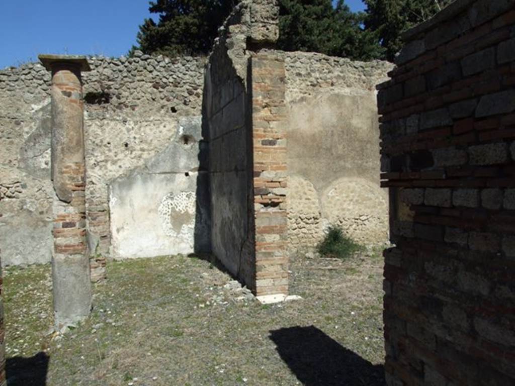 VIII.5.37 Pompeii.  March 2009.  Room 6, Corridor, leading into East Portico. Looking north to second doorway to Room 8 in west wall.