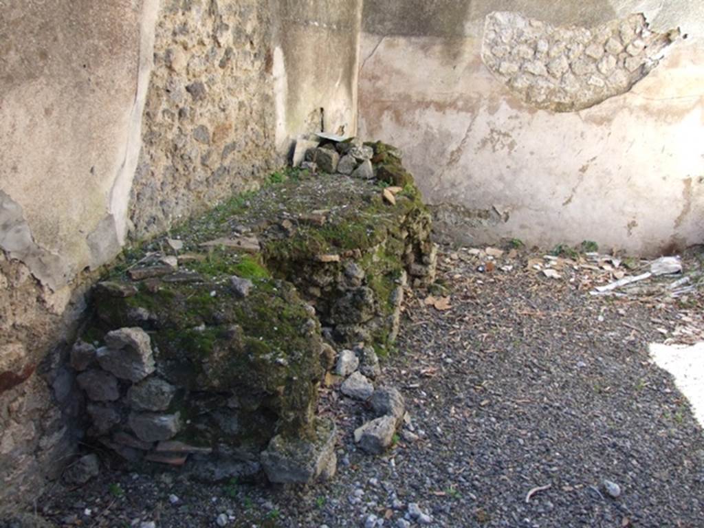 VIII.5.37 Pompeii. March 2009. Room 15, hearth against south wall of kitchen.