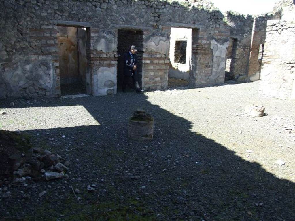 VIII.5.39 Pompeii. March 2009. West side of room 1, with remains of two columns. Doorways to rooms 2, 4, 5 and 6

