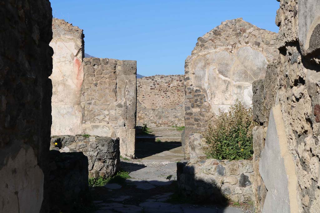 VIII.6.1, Pompeii. December 2018.
Looking north from entrance corridor and across bakery room towards rooms at rear, see VIII.6.10. Photo courtesy of Aude Durand.