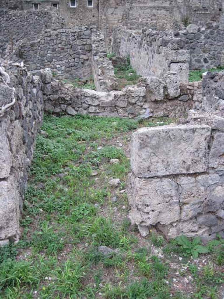 VIII.7.8 Pompeii. September 2010. Doorway to cubiculum on west side of shop. Photo courtesy of Drew Baker. According to Della Corte, in 79AD in this ample shop with several communicating rooms, lived one Marcus Surus. We cannot guess what commerce or industry was carried on in his shop. However, we do know he was a veteran of the Misenum fleet, in which he had served for 26 years as a rower. He was of Gerasa, a city of the Decapolis in Jordan/Palestine, and had transferred to Pompeii from Paestum. In his cubiculum where he slept, was found preserved the authentic copy in bronze of the decree of his discharge in the year 71AD by Vespasian, by which he was accorded Roman citizenship. This decree was found on 16th July 1874 and is CIL X 867, and names M.  Damae f. Suro Garaseno. See Della Corte, M., 1965.  Case ed Abitanti di Pompei. Napoli: Fausto Fiorentino. (p.263). See Wikipedia for description of ten cities of Decapolis. Now in Naples Archaeological Museum.  Inventory number 110043.
