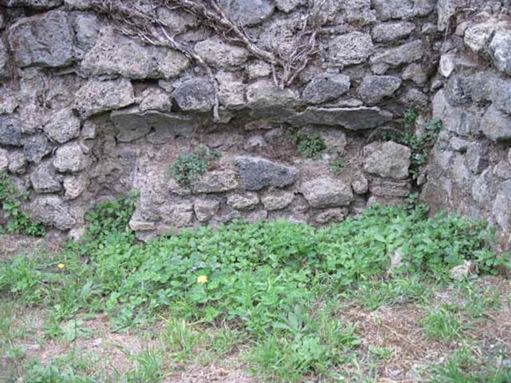 VIII.7.11 Pompeii. September 2010. Curved plaster feature of recess in cubiculum. Photo courtesy of Drew Baker.
