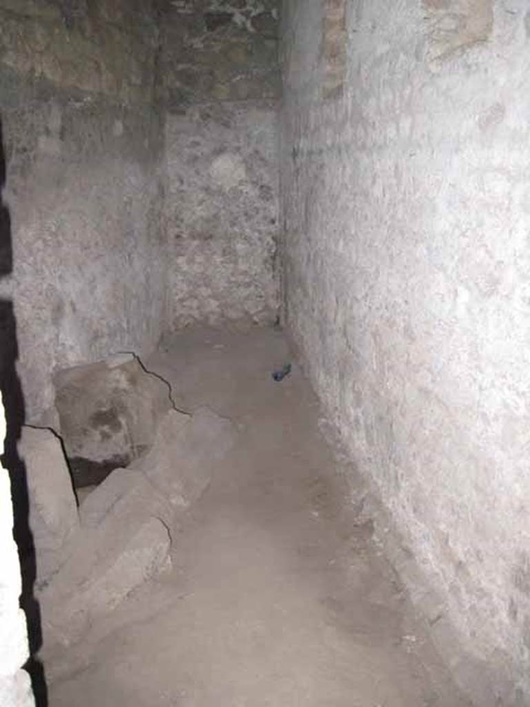 VIII.7.21 Pompeii. September 2010.  Windows from the latrine out into the triangular forum on west wall.  Looking south towards quadriporticus.  Photo courtesy of Drew Baker.
