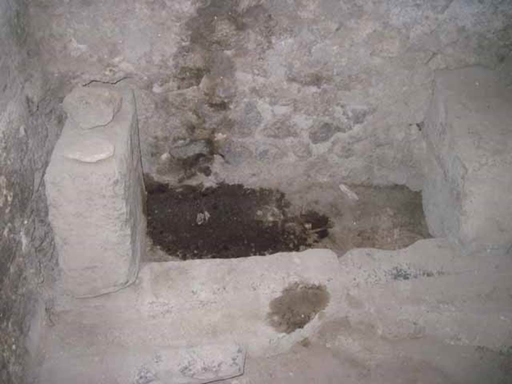 VIII.7.21 Pompeii. September 2010. Latrine #1 on left hand side on east wall.  Orientation east towards theatre.  Photo courtesy of Drew Baker.
