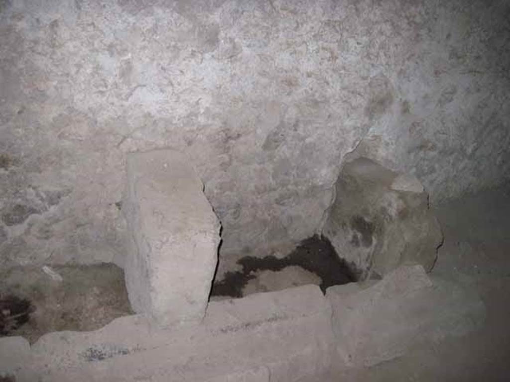 VIII.7.21 Pompeii. September 2010. Latrine #2 on right hand side on east wall.  Orientation east towards theatre.  Photo courtesy of Drew Baker.
