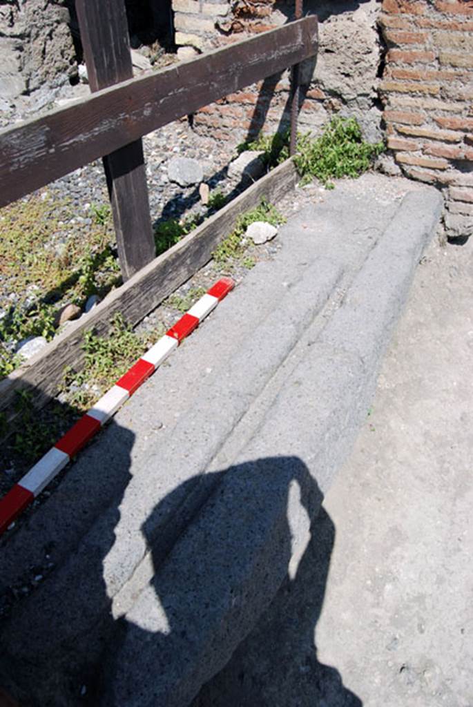 VIII.7.23 Pompeii. June 2009. Threshold of entrance doorway, looking north. Photo courtesy of Sera Baker.
