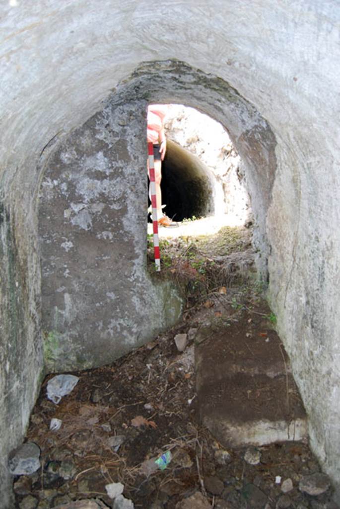 VIII.7.22 Pompeii. June 2009. Looking west from room D towards steps to corridor. 
Photo courtesy of Sera Baker.
