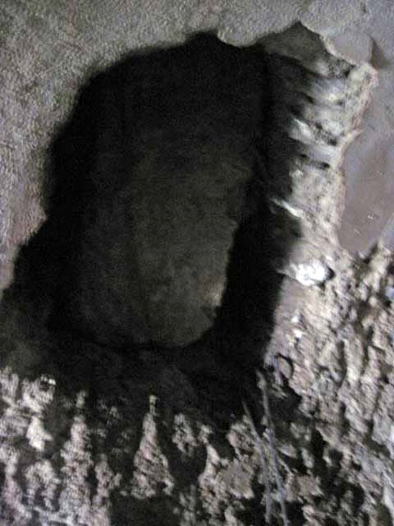 VIII.7.22/23/24 Pompeii. October 2010. Detail of blocked opening in south wall of room E.
Photo and information courtesy of Drew Baker/Gareth Beale/Hembo Pagi.
