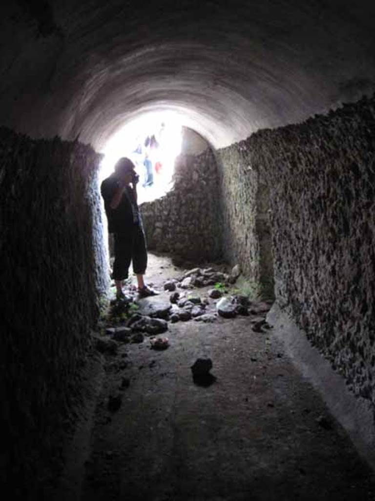 VIII.7.22/23/24 Pompeii. October 2010. Room E, looking east towards access point in area C. Note door to room F, on the right. Photo and information courtesy of Drew Baker/Gareth Beale/Hembo Pagi.
