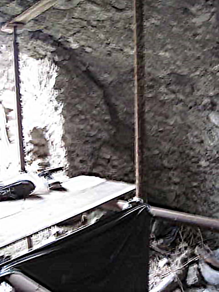 VIII.7.24 Pompeii. October 2010. North-east corner of storage room on south side of atrium.
Photo and information courtesy of Drew Baker/Gareth Beale/Hembo Pagi.
