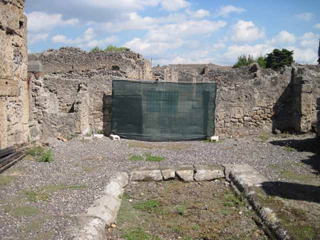 VIII.7.24 Pompeii. September 2010. East side of atrium with entrance doorway, looking towards Via Stabiana. Photo courtesy of Drew Baker.
