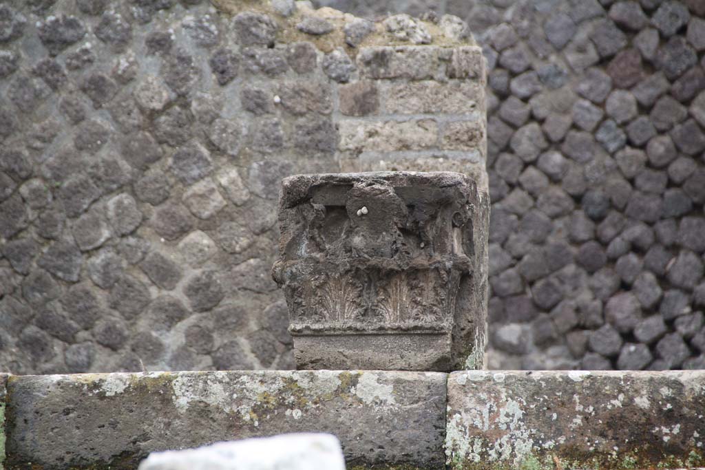 VIII.7.25 Pompeii. April 2014. Capital on podium. Photo courtesy of Klaus Heese.

