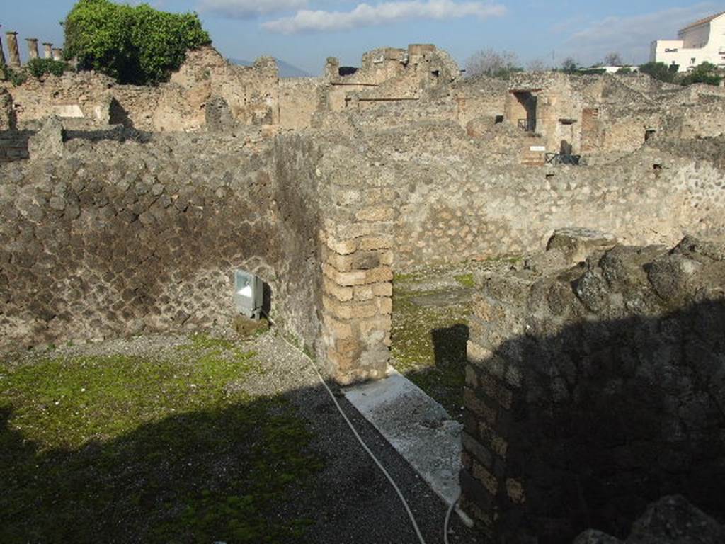 VIII.7.25 Pompeii. December 2006. Looking north-east in shrine on podium.