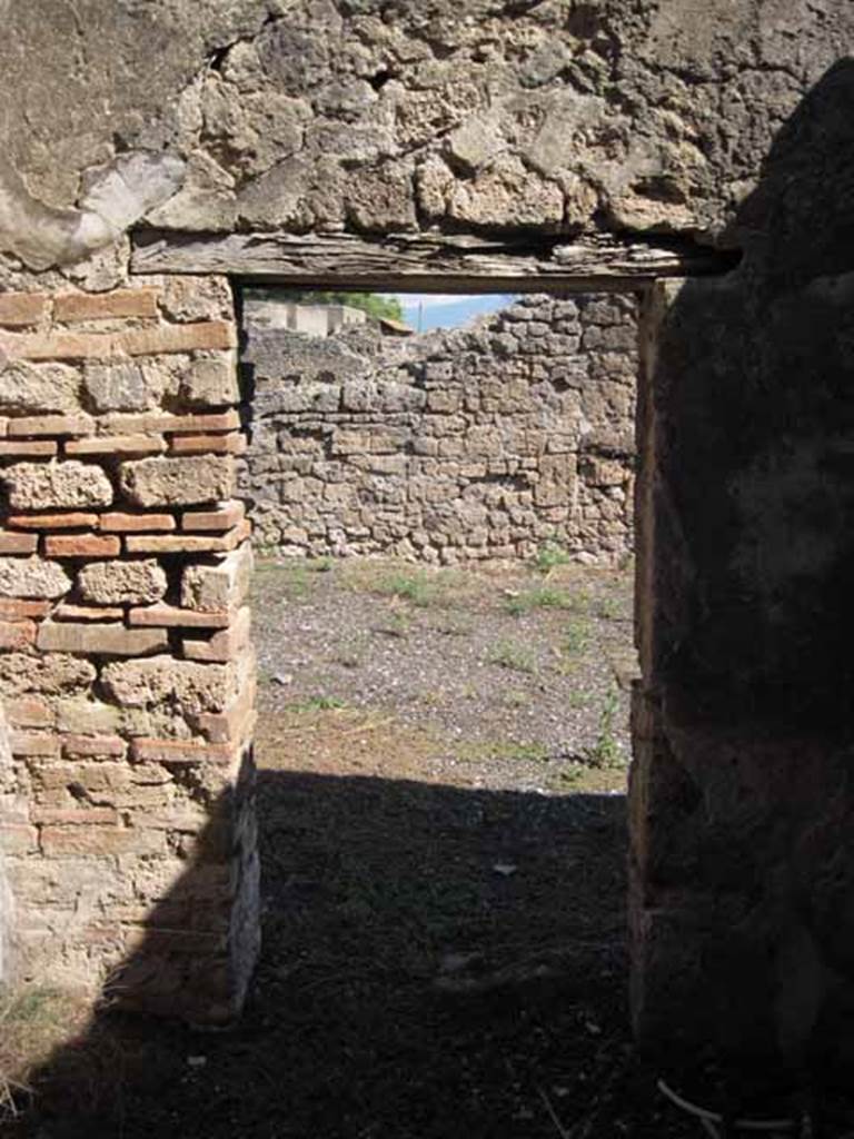 VIII.7.26 Pompeii. September 2010. Looking east through doorway into atrium, from second room. Photo courtesy of Drew Baker.