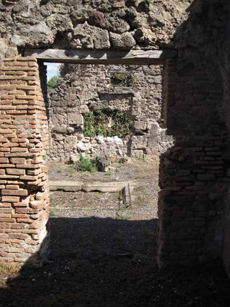 VIII.7.26 Pompeii. September 2010. Looking east into atrium through doorway of third room. Photo courtesy of Drew Baker.