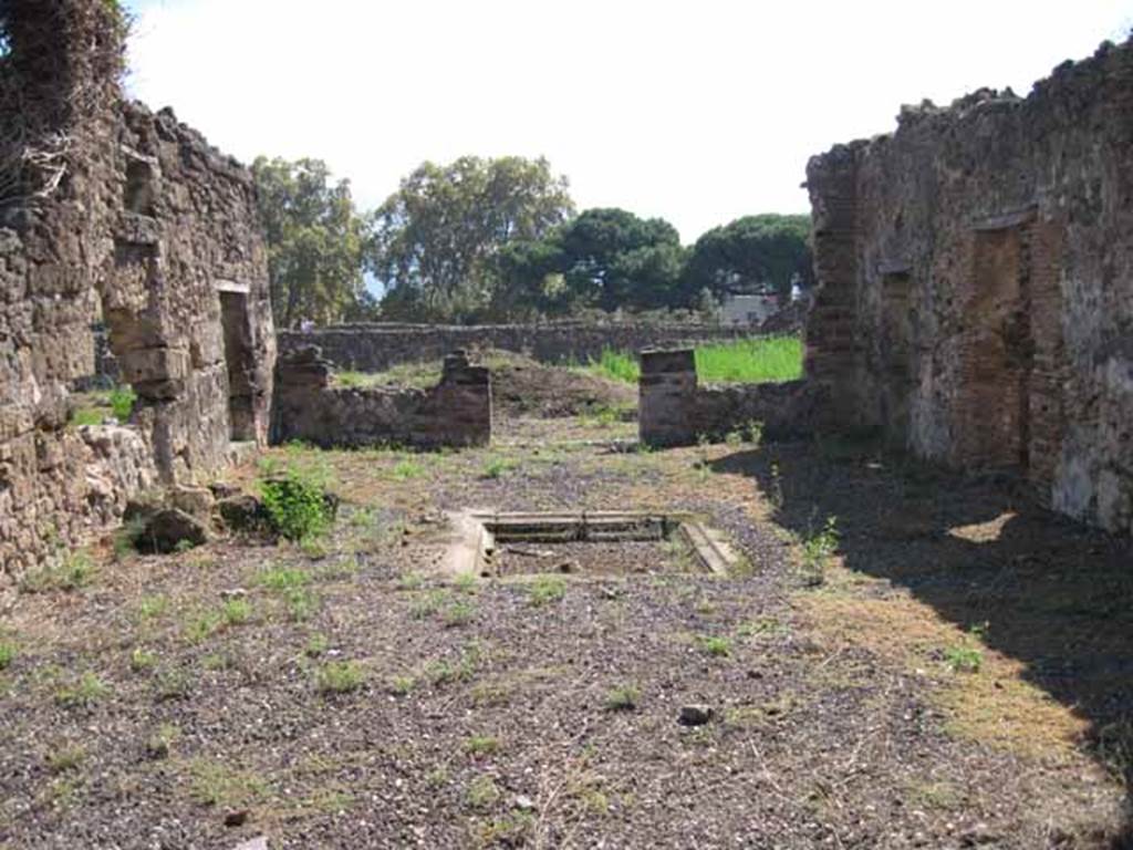 VIII.7.26 Pompeii. September 2010. Looking south across atrium towards garden area and the Odeon. Photo courtesy of Drew Baker.
