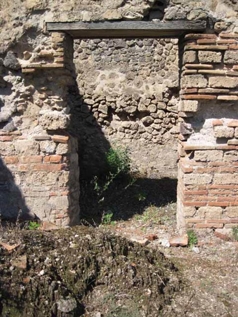 VIII.7.26 Pompeii. September 2010. Doorway into fourth cubiculum on west side of atrium, looking north from north portico. Photo courtesy of Drew Baker.