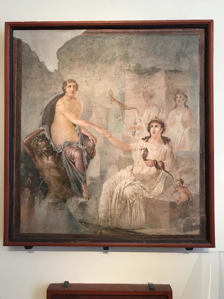 VIII.7.28 Pompeii. April 2019. Arrival of Io at Canopus. 
Isis offers her hand as her priestesses shake their sistra. 
Found in the centre of the south wall of the Ekklesiasterion in November 1765. 
Now in Naples Archaeological Museum. Inventory number 9558.
Photo courtesy of Rick Bauer.
