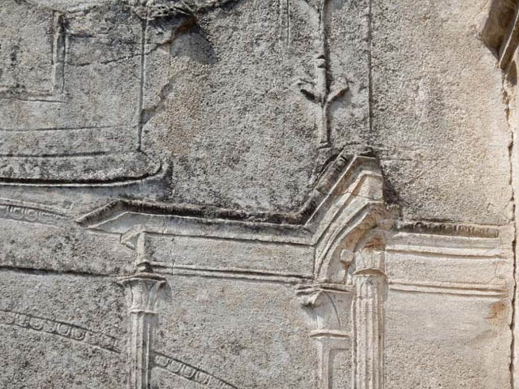 VIII.7.28, Pompeii. May 2015.  Detail of decorative stucco on north side of doorway.
Photo courtesy of Buzz Ferebee.

